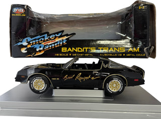 Burt Reynolds & Paul Williams Signed Smokey And The Bandit 1:18 Scale Die-Cast Car (JSA)