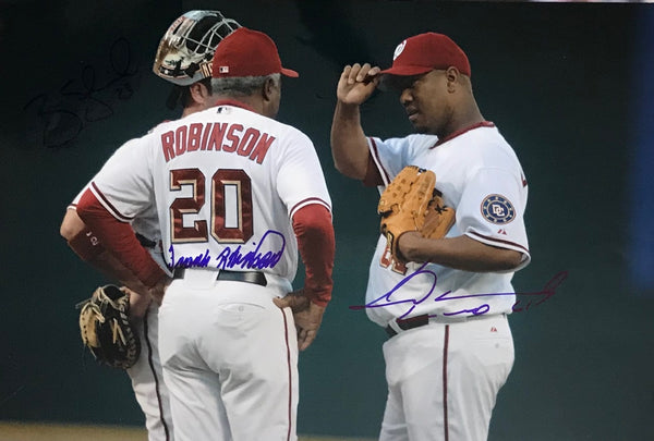 Brian Schneider, Frank Robinson, Livan Hernandez Autographed 11x14 Photo