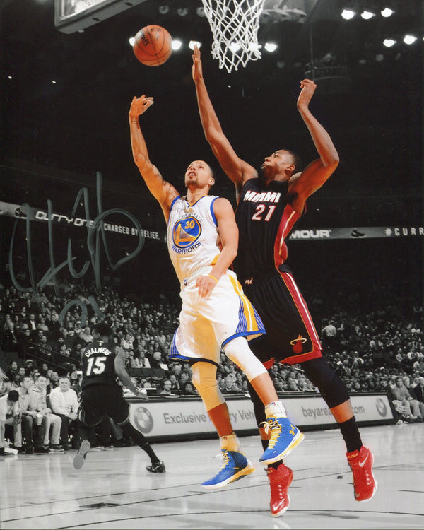 Hassan Whiteside Autographed Spotlight Vs. Stephen Curry 8x10 Photo