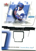 Carlos Delgado 2002 Fleer Genuine Names of The Game Jersey Card